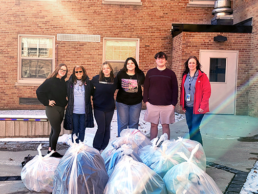 The Visions Harpursville High School branch interns and Iva Jean Tennant (Kenzee Jean Scholarship) pictured with collected cans.
